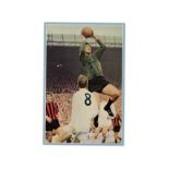 Joe Corrigan signed 16x12 overall mounted colour magazine photo pictured in action for Manchester