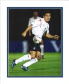 Frank Lampard signed 12x10 mounted colour photo pictured in action for England. Frank James
