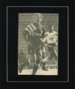 Graeme Souness signed 12x10 mounted black and white magazine photo pictured playing from