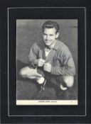 Gordon Milne signed 16x12 mounted black and white magazine photo pictured during his playing days
