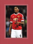 Anthony Martial signed 16x12 mounted colour photo pictured in action for Manchester United.