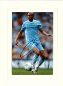 Gael Clichy signed 16x12 overall mounted colour photo pictured in action for Manchester City. Gael