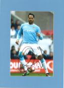 Joleon Lescott signed 16x12 mounted colour photo pictured in action for Manchester City. He played