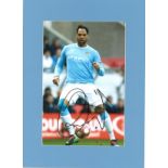 Joleon Lescott signed 16x12 mounted colour photo pictured in action for Manchester City. He played