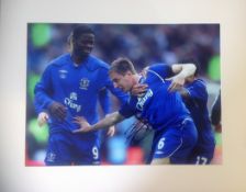 Phil Jagielka signed 20x16 mounted colour photo pictured celebrating while playing for Everton F. C.