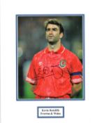 Kevin Ratcliffe signed 14x12 mounted colour photo pictured lining up for Wales. Good Condition.
