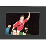 Mark Robins signed 16x12 overall mounted colour photo pictured during his playing days with