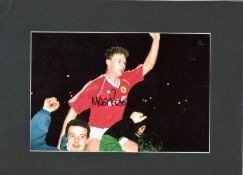 Mark Robins signed 16x12 overall mounted colour photo pictured during his playing days with