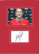 Bastian Schweinsteiger 16x12 overall includes signed album page and colour photo pictured while at