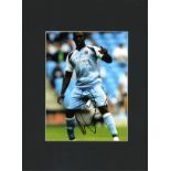 Micah Richards signed 16x12 overall mounted colour photo pictured playing for Manchester City. Micah