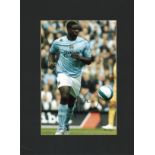 Micah Richards signed 16x12 overall mounted colour photo pictured playing for Manchester City. Micah