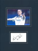 Kevin Nolan 16x12 mounted signature piece includes signed album page and colour pictured playing for