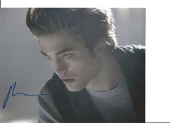 Twilight signed photo collection. 4 photos in total each individually signed by Robert Pattinson,