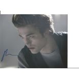 Twilight signed photo collection. 4 photos in total each individually signed by Robert Pattinson,