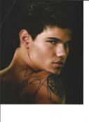 Taylor Lautner signed 10 x 8 colour photo from The Twilight Saga. Good Condition. All autographs are