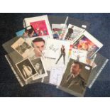 Assorted TV/Music signed collection. 16 items. Mainly colour photos, flyers and signature pieces.