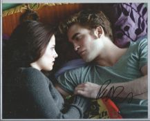 Robert Pattinson signed 10x8 colour photo.. Good Condition. All autographs are genuine hand signed