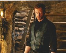 Blowout Sale! Lost Girl Kris Holden-Ried hand signed 10x8 photo. This beautiful hand signed photo