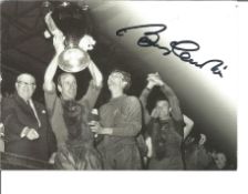 Bobby Charlton signed 6 x 4 inch b/w photo holding the European cup. Good Condition. All