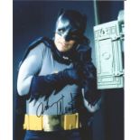 Adam West as Batman signed 10 x 8 colour photo. Good Condition. All autographs are genuine hand