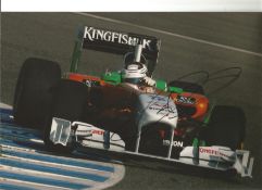 Formula 1 Adrian Sutil Grand Prix racing driver signed Force India car in action photo. Comes with