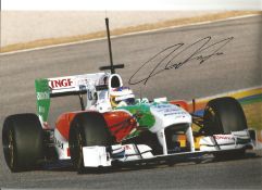 Formula 1 Paul Di Resta Grand Prix racing driver signed Force India car in action photo. Comes