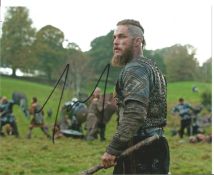 Blowout Sale! Travis Fimmel Vikings hand signed 10x8 photo. This beautiful hand signed photo depicts