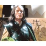 Doctor Who 8x10 photo scene from Doctor Who signed by actor Julian Glover. Good Condition. All