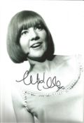 Cilla Black Signed 12 x 8 inch music photo. Good Condition. All autographed items are genuine hand