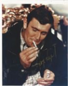 George Lazenby signed 10x8 colour photo. Good Condition. All autographed items are genuine hand