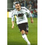 Football Piotr Trochowski 12x8 signed colour photo pictured in action for Germany. Good Condition.