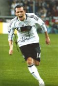 Football Piotr Trochowski 12x8 signed colour photo pictured in action for Germany. Good Condition.