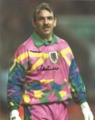 Football Neville Southall signed 10x8 colour photo pictured while playing for Wales. Good Condition.