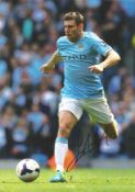Football James Milner 12x8 signed colour photo pictured in action for Manchester City. Good