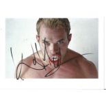 Kellan Lutz signed 10x8 colour photo. Good Condition. All autographed items are genuine hand