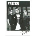 Feeder signed 6x4 black and white promo photo signed by all three band members. Good Condition.