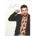 Lee Mack signed 6x4 colour promo photo. Good Condition. All autographed items are genuine hand