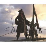 Johnny Depp signed 10x8 colour photo. Good Condition. All autographed items are genuine hand