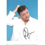 Ricky Gervais signed 7x5 colour photo. Good Condition. All autographed items are genuine hand signed