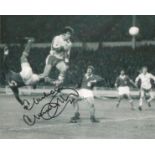 Football Malcom Macdonald signed 10x8 black and white photo pictured in action for England. Good