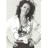 Danni Minogue signed 6x4 black and white promo photo dedicated. Good Condition. All autographed