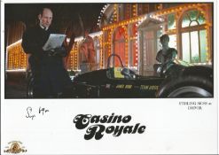 Stirling Moss signed 10x8 Casino Royale colour photo picturing the Motor Racing legend in his roll