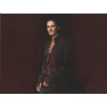 Orlando Bloom signed 10x8 Pirates of the Caribbean colour photo. Good Condition. All autographed