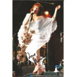 Florence and the Machine signed 6x4 colour photo. Good Condition. All autographed items are
