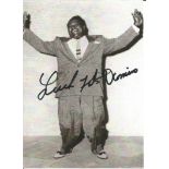 Fats Domino signed 7 x 5 inch b/w photo. Good Condition. All autographed items are genuine hand