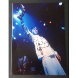 Ian Brown Stone Roses signed 16 x 12 inch colour photo on stage. Good Condition. All autographed