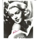Lana Turner signed 10 x 8 inch b/w photo signed in pink. Good Condition. All autographed items are
