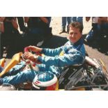 Formula One Michael Schumacher signed 12 x 8 inch colour photo in Kart n Benneton racing overalls.