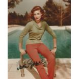 Lauren Bacall signed 10 x 8 inch colour photo. Good Condition. All autographed items are genuine