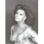 Sophia Loren signed sexy 10 x 8 inch b/w photo. Good Condition. All autographed items are genuine